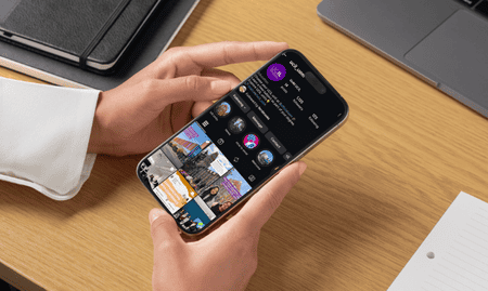 A person looking at their phone, on the UCIL Instagram feed.