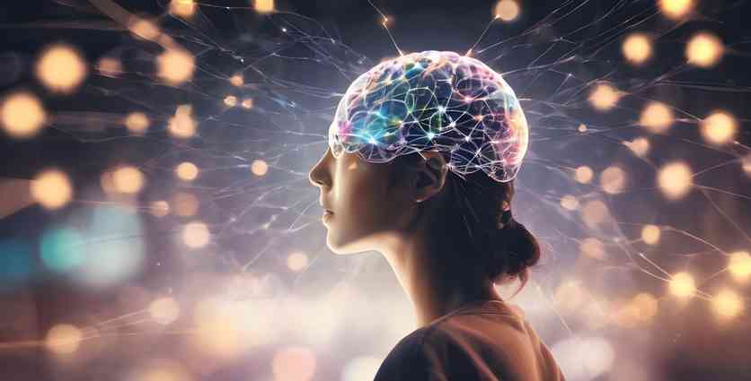 A profile view of a person with a glowing, interconnected brain above their head, surrounded by bokeh lights and network lines.