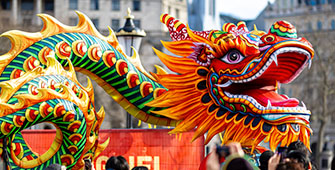 Colourful Chinese dragon at a parade.